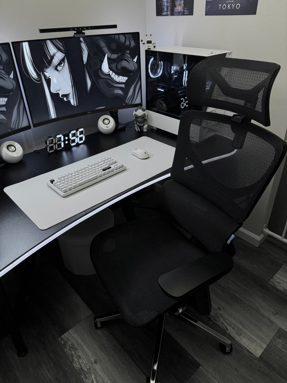OdinLake office chair arranged with a desk, multiple monitors, keyboard, and computer tower