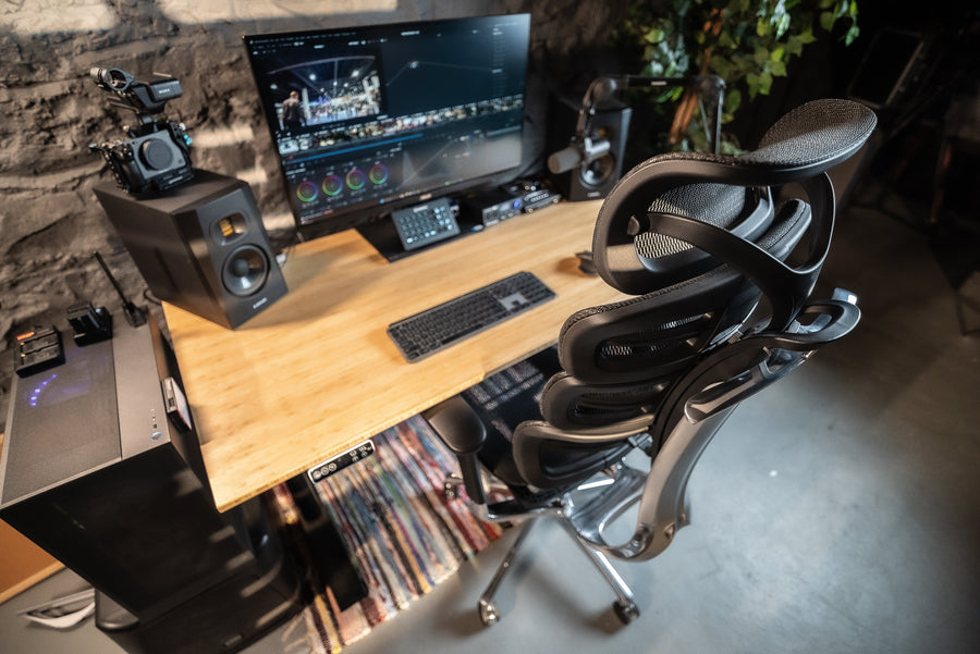 OdinLake O2 ergonomic chair at a desktop video-editing workstation