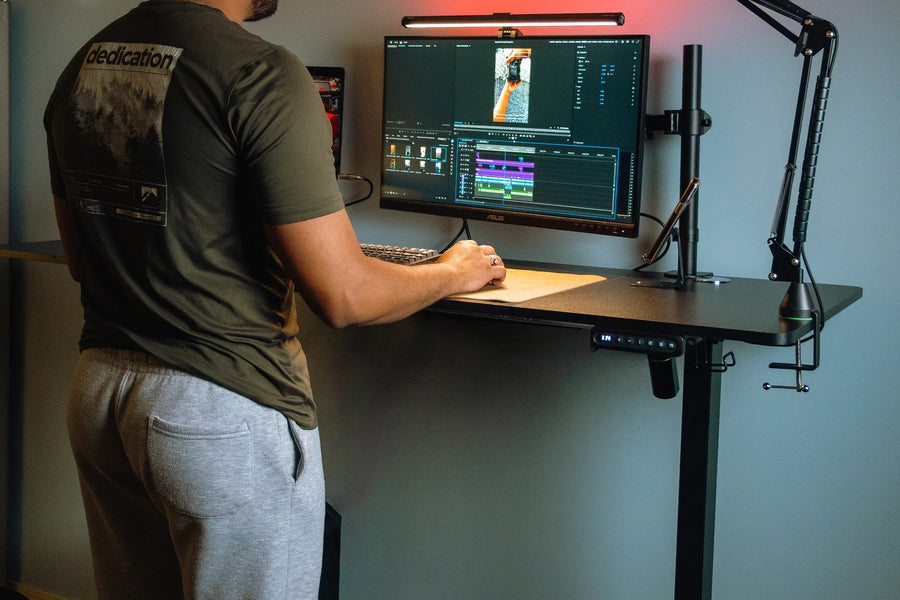 Person using an OdinLake S2 standing desk at standing height