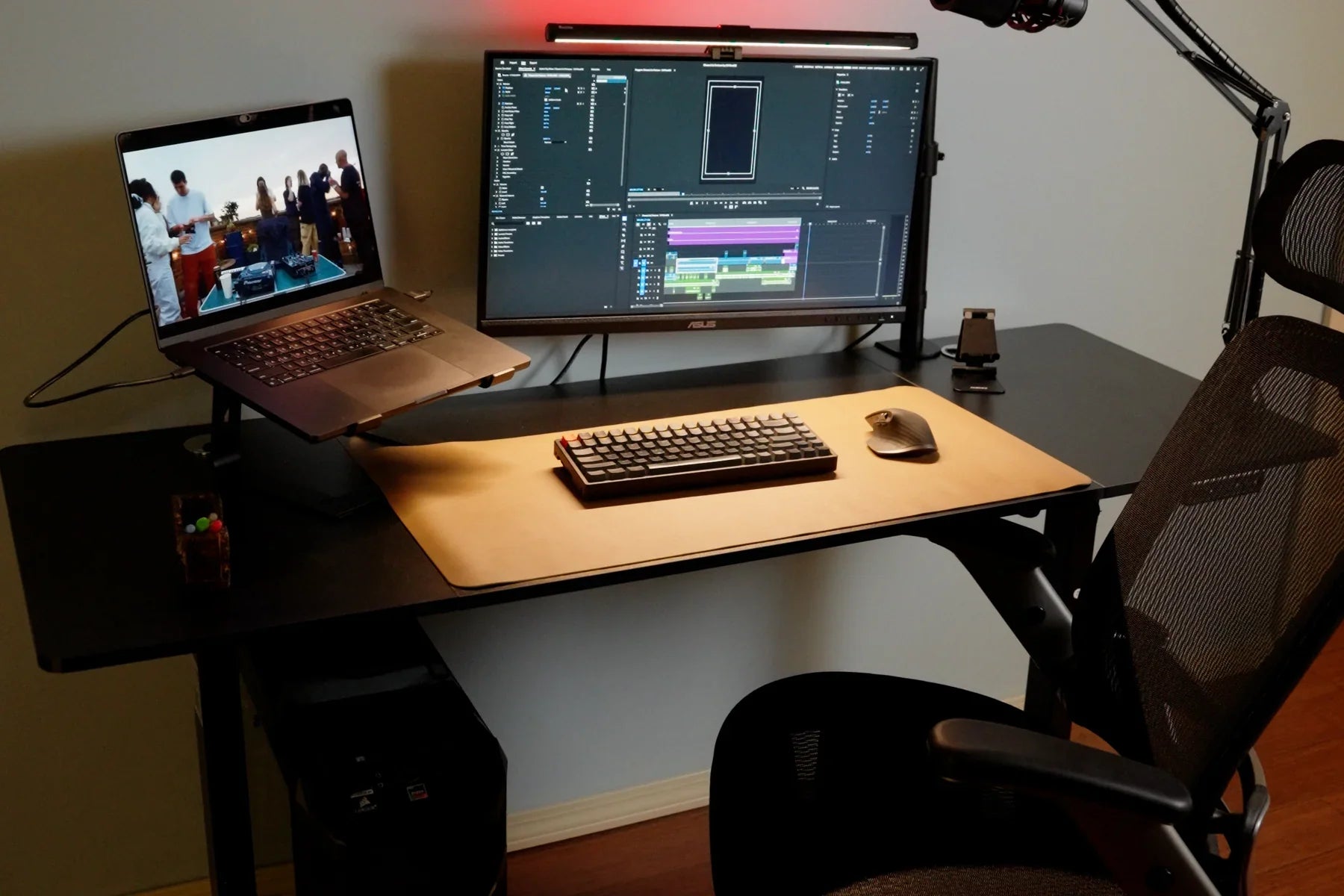 OdinLake standing desk in use with laptop, monitor, keyboard, mouse, lighting, and microphone