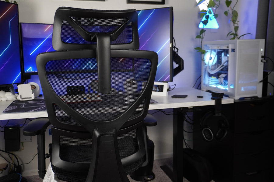 OdinLake L1 office chair positioned in front of a wide computer desk