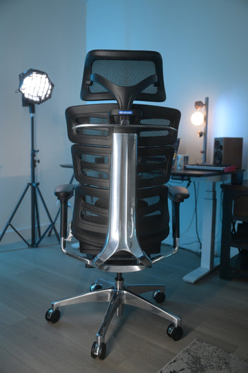Rear view of an OdinLake O2 office chair showing the headrest and segmented backrest