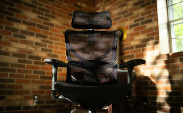 Front view of an OdinLake ergonomic office chair showing the usable seat and the side boundaries created by the armrests