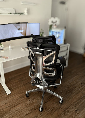 OdinLake office chair casters resting on a clean dark wood floor in a home office