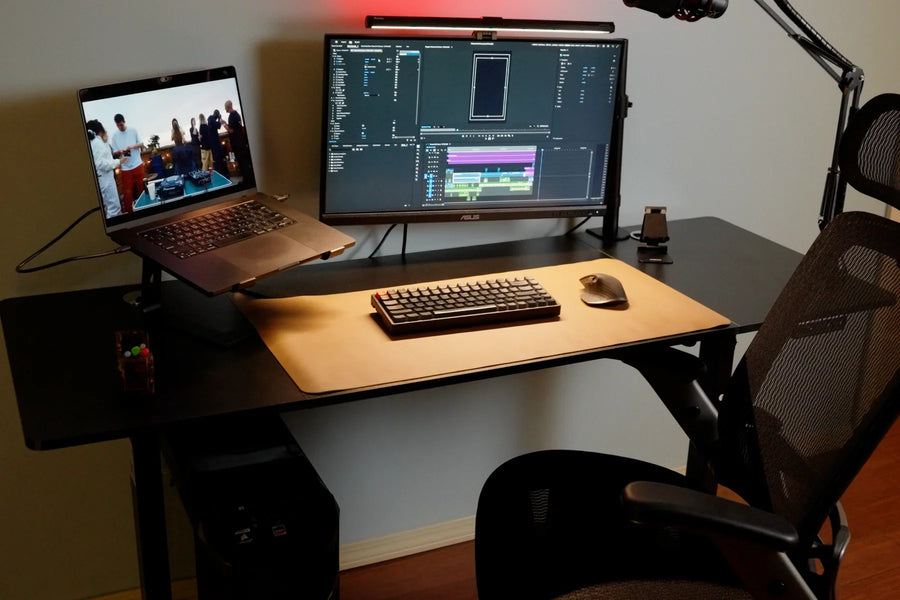 OdinLake standing desk in use with laptop, monitor, keyboard, mouse, lighting, and microphone