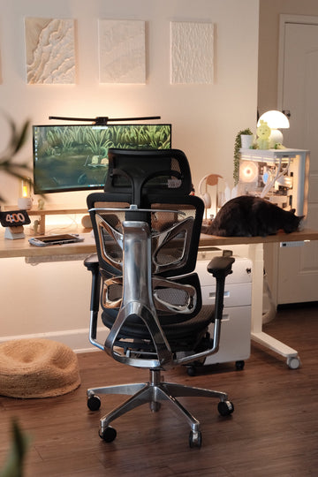Rear view of an OdinLake O3 ergonomic chair with its five-star base visible in a home office